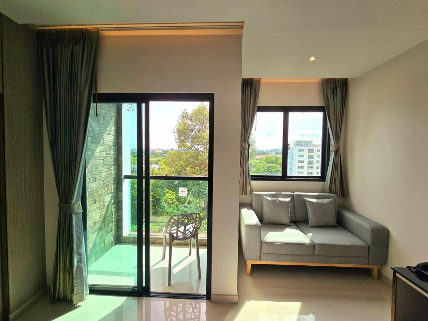 The TJ Hotel Jomtien Buitenkant foto